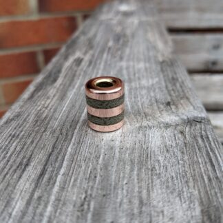 Copper micarta stack bead with brass centre tube