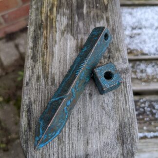 Copper pirate spike pry with shipwrecked patina and matching bead.